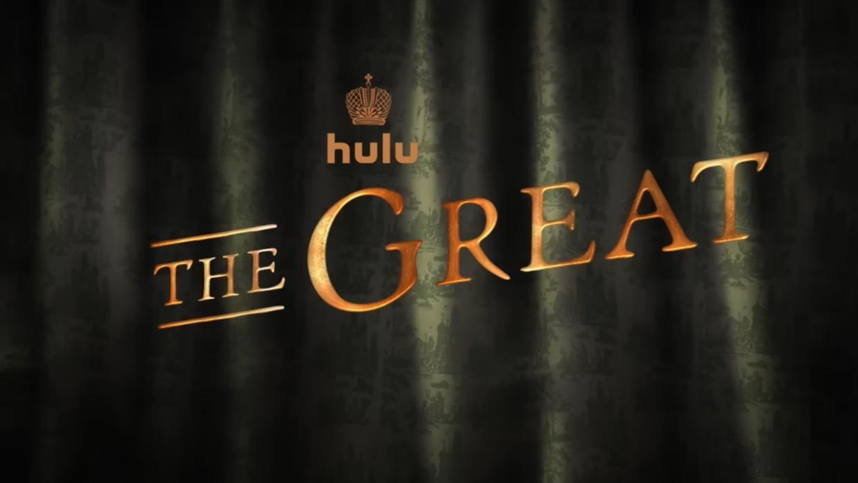  A green curtain with the words "hulu The Great" over it. 