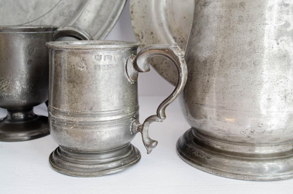 Two pewter mugs