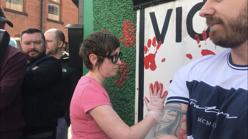 They left red handprints on the walls of Junior McDaid House in Londonderry.