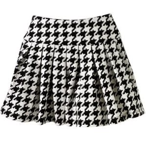 Got a teacher's pet on your hands? She might like swishing into class wearing this houndstooth skirt.