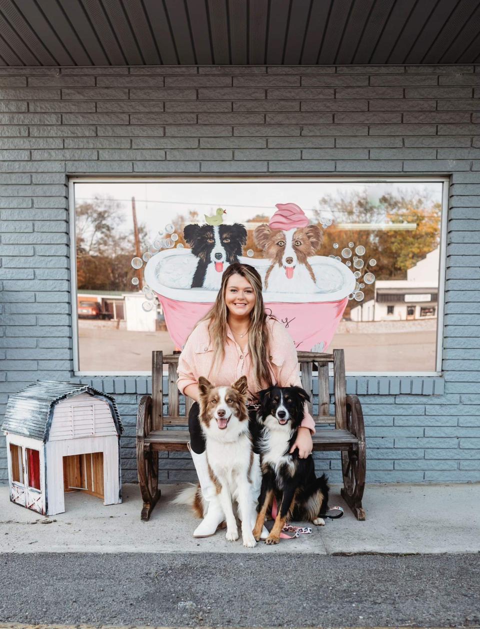 Callie Dawson and her Australian shepherds Bella and Coco are the hosts for the Roots Paws Salon and Boutique.
