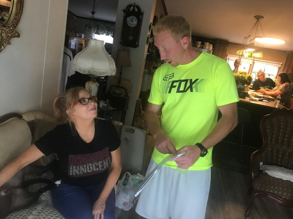Adam Braseel, right, talks with his sister Christina at the family home in Pelham, Tenn., a day after his release from prison. Braseel spent 12 years convicted of a murder he always denied. Prosecutors agreed to dismiss the conviction Aug. 2.
