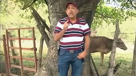 Mexican drug lord Servando "La Tuta" Gomez speaks as he tapes messages in Michoacan in this still image taken from an undated file video. REUTERS/Servando Gomez family handout via Reuters TV/Files