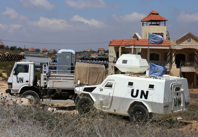 UN vehicles are seen in Houla village near the Lebanese-Israeli border, in southern Lebanon