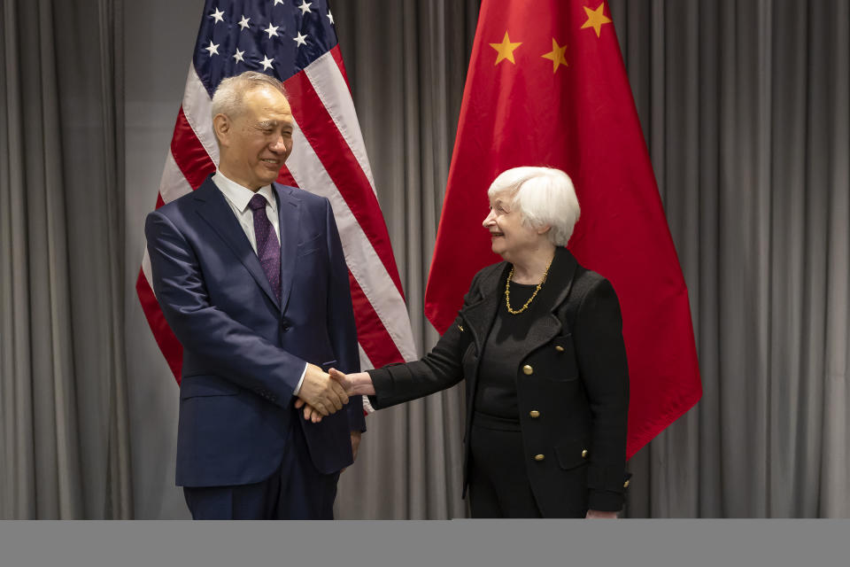 Treasury Secretary Janet Yellen, right, shakes hands with China's Vice-Premier Liu He during a bilateral meeting in Zurich, Switzerland on Wednesday, Jan. 18, 2023. (Michael Buholzer/Keystone via AP)