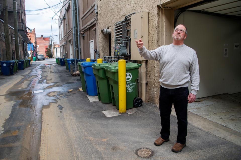 Ken Pierce is not only active as a board member of his building's homeowner association, but has worked with business owners to help clear up the alley next to the building, an alley that he described as once "unbelievably horrible."