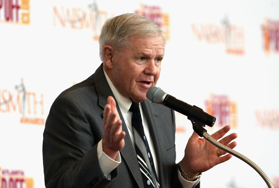 HOUSTON, TEXAS - APRIL 03:  Former head coach Denny Crum of the Louisville Cardinals speaks at the podium after being presented with the 2016 Naismith Outstanding Contributor to Mens Basketball Award during the 2016 Naismith Awards Brunch at Hobby Center for the Performing Arts on April 3, 2016 in Houston, Texas.  (Photo by Tim Bradbury/Getty Images)