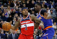 Basketball - NBA - Washington Wizards v New York Knicks - The O2 Arena, London, Britain - January 17, 2019 Washington Wizards' Bradley Beal in action with New York Knicks' Damyean Dotson Action Images via Reuters/Andrew Boyers