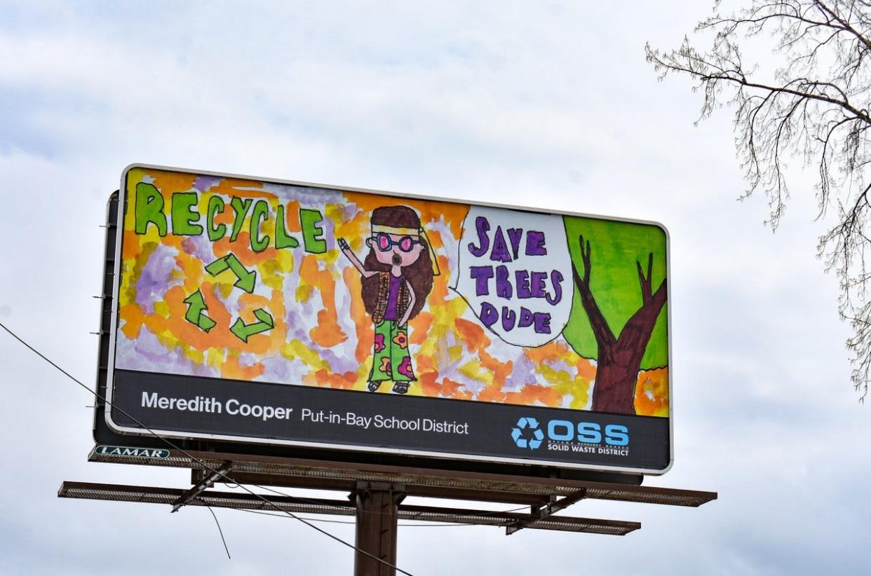 Meredith Cooper’s hippie-themed design is displayed on the billboard in Port Clinton. Cooper attends Put-in-Bay Elementary School.