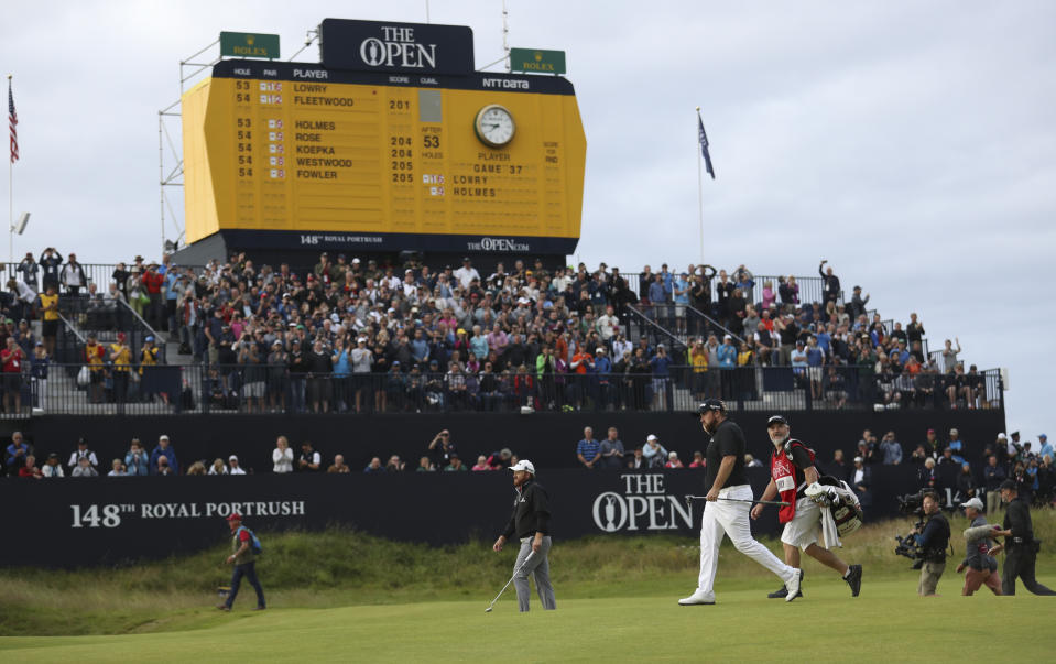 Ireland's Shane Lowry walks onto the 18th green during the third round of the British Open Golf Championships at Royal Portrush in Northern Ireland, Saturday, July 20, 2019.(AP Photo/Peter Morrison)