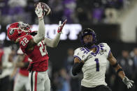 Georgia defensive back Javon Bullard (22) intercepts the ball intended for TCU wide receiver Quentin Johnston (1) during the first half of the national championship NCAA College Football Playoff game, Monday, Jan. 9, 2023, in Inglewood, Calif. (AP Photo/Mark J. Terrill)
