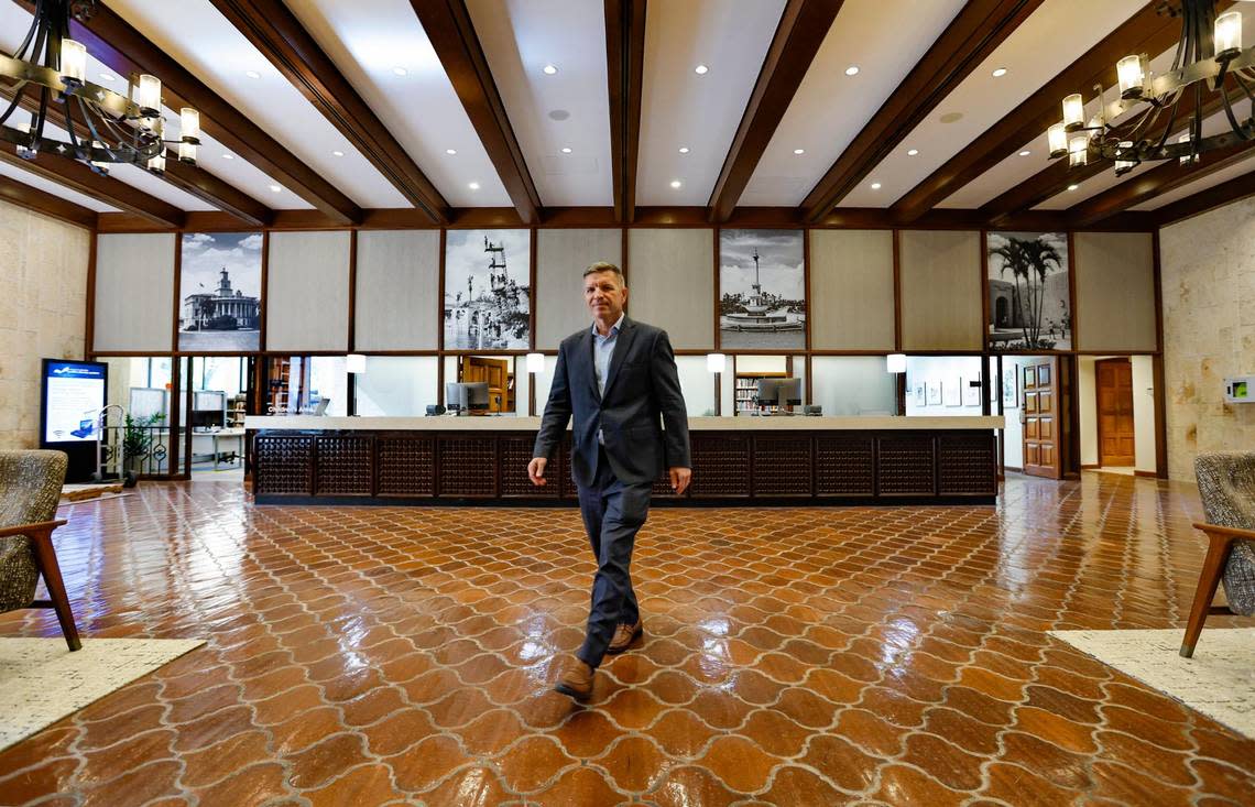 Miami-Dade Public Library System Director Ray Baker walks through the front lobby of Coral Gables Branch Library with plans to reopen on Monday, May 22 after closing for renovations in 2021. The library is located at 3443 Segovia Street in Coral Gables on Tuesday, May 16, 2023. Al Diaz/adiaz@miamiherald.com