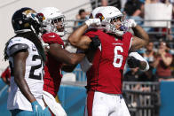 Arizona Cardinals running back James Conner (6) celebrates his 1-yard touchdown run against the Jacksonville Jaguars during the second half of an NFL football game, Sunday, Sept. 26, 2021, in Jacksonville, Fla. (AP Photo/Stephen B. Morton)