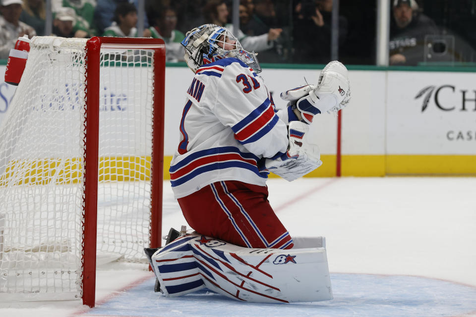 New York Rangers goaltender Igor Shesterkin (31) recovers after a roughing penalty against the Dallas Stars during the first period of an NHL hockey game in Dallas, Saturday, Oct. 29, 2022. (AP Photo/Michael Ainsworth)