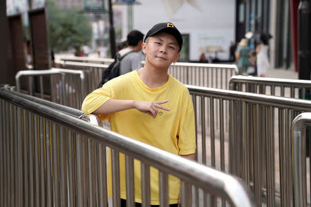 Li Yijie, a member of the Sichuan-based rap band Tianfu Shibian, poses for a photo ahead of Reuters interview in Beijing, China August 10, 2017. Picture taken August 10, 2017. REUTERS/Jason Lee