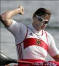 German Birgit Fischer celebrates after finishing first in the Women's K4 500m final with teammates Nollen Maike, Katrin Wagner and Carolin Leonhardt (not pictured) for the Athens 2004 Olympic Games at the Schinias Rowing and Canoeing Center, outside Athens, 27 August 2004. AFP PHOTO / MAXIM MARMUR