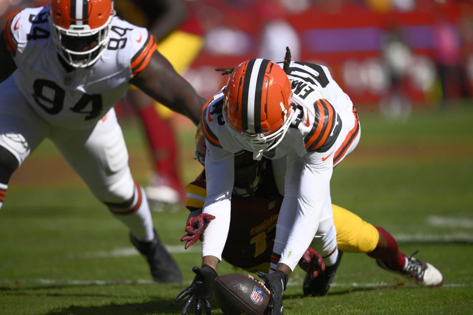 Cleveland Browns cornerback Martin Emerson Jr. (23) recovers a fumble against the Washington Commanders during the second half of an NFL football game in Landover, Md., Sunday, Oct. 6, 2024. (AP Photo/Nick Wass)