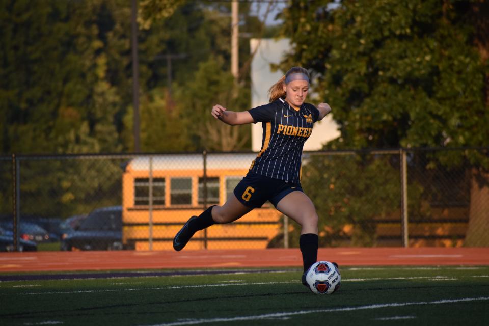 Mooresville defender Kennedy Bohr kicks one to midfield after the ball went out of bounds in their sectional match against Plainfield on Oct. 5, 2021.