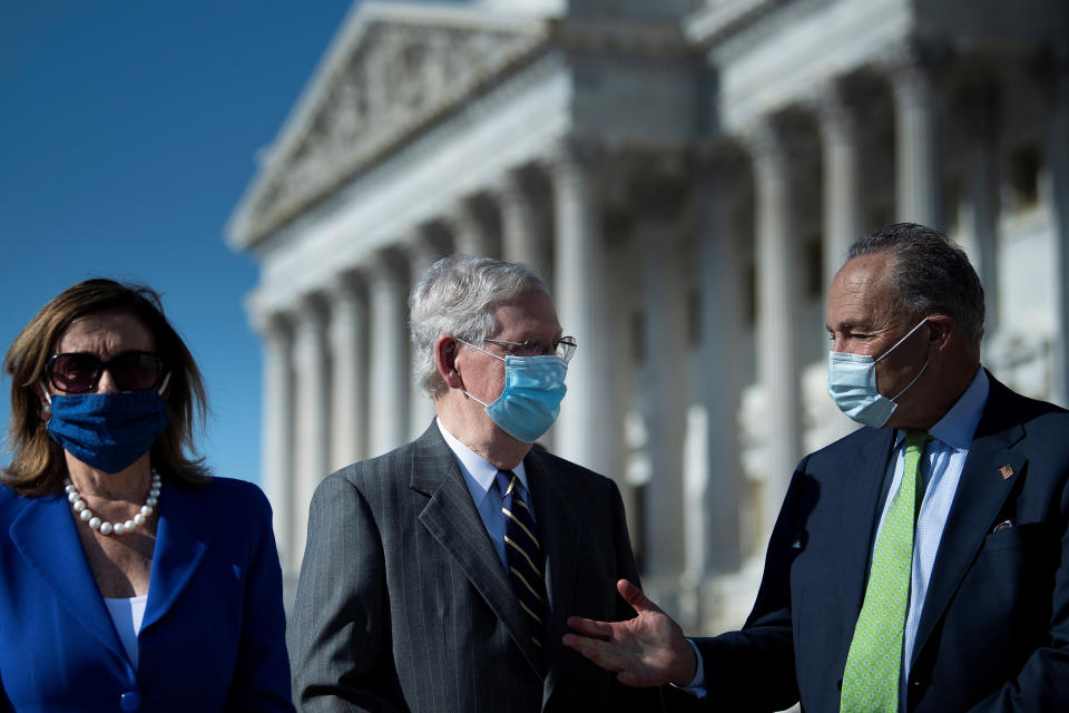 House Speaker Nancy Pelosi (D-Calif., from left) and Senate Majority Leader Mitch McConnell (R-Ky.) hashed out a deal to give Americans some financial relief during the pandemic. (Photo: Brendan Smialowski/Pool via REUTERS)