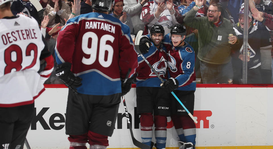 DENVER, COLORADO - OCTOBER 12: Nazem Kadri #91 of the Colorado Avalanche celebrates with teammates Cale Makar #8 and Mikko Rantanen #96 after scoring a goal against the Arizona Coyotes at the Pepsi Center on October 12, 2019 in Denver, Colorado. (Photo by Michael Martin/NHLI via Getty Images)