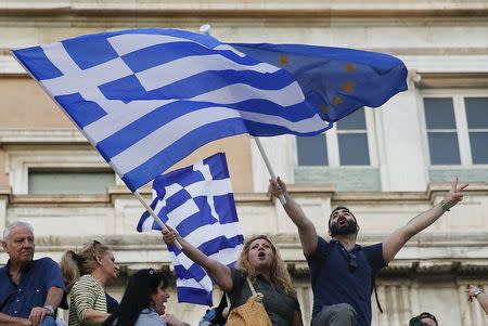 Protesters occupy the exterior of the parliament, during a rally calling on the government to clinch a deal with its international creditors and secure Greece's future in the Eurozone, in Athens June 18, 2015. REUTERS/Paul Hanna