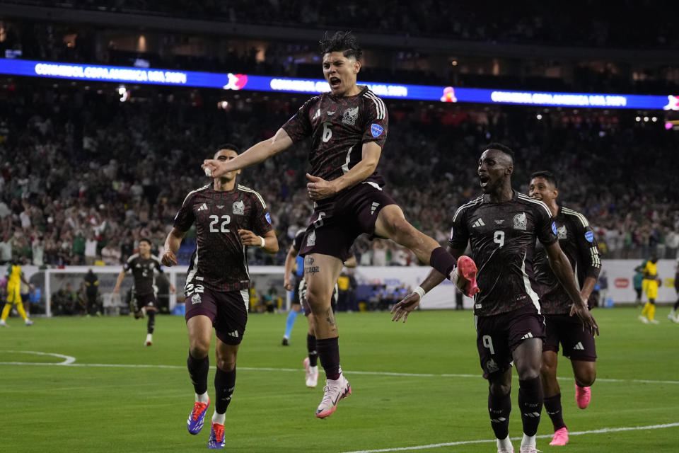 Mexico's Gerardo Arteaga celebrates scoring his side's opening goal against Jamaica during a Copa America Group B soccer match in Houston, Saturday, June 22, 2024. (AP Photo/David J. Phillip)