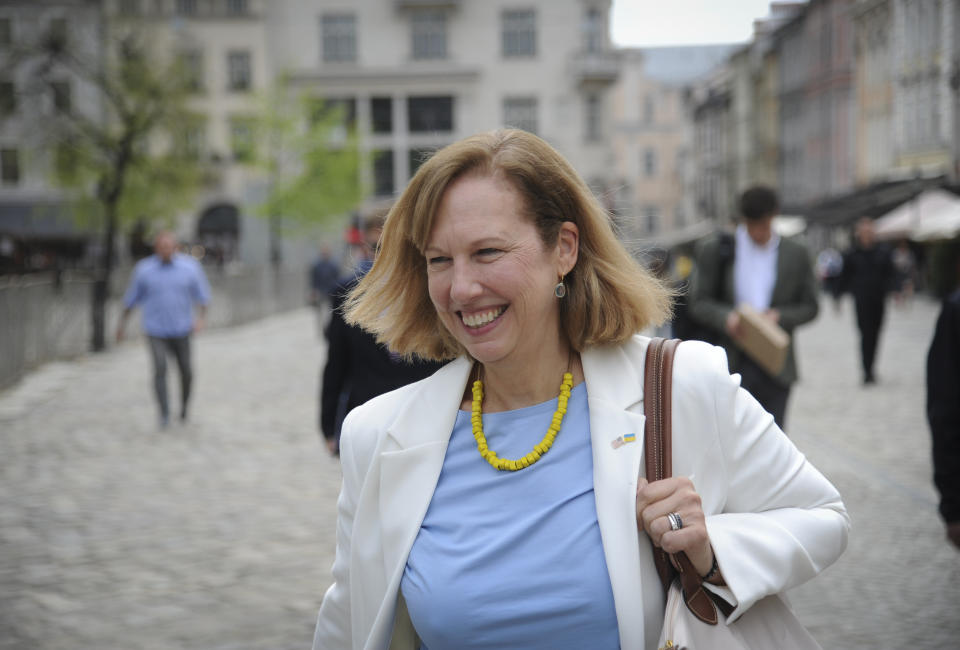 Acting United States ambassador to Ukraine, Kristina Kvien, smiles as she arrives for her press briefing in Lviv, Ukraine, Monday, May. 2, 2022. (AP Photo/Mykola Tys)