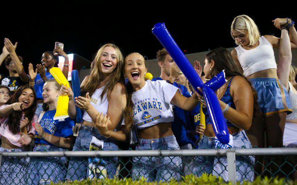 Delaware fans cheer their team after the Blue Hens' 42-14 win against Saint Francis at Delaware Stadium, Saturday Sept. 16, 2023.
