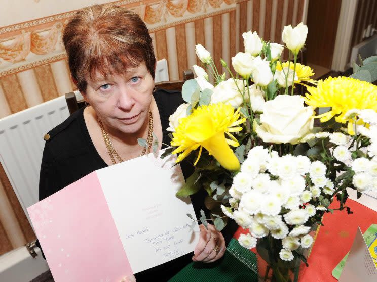 Linda Heald received a card, flowers and a box of chocolates from her Tesco delivery driver [SWNS]