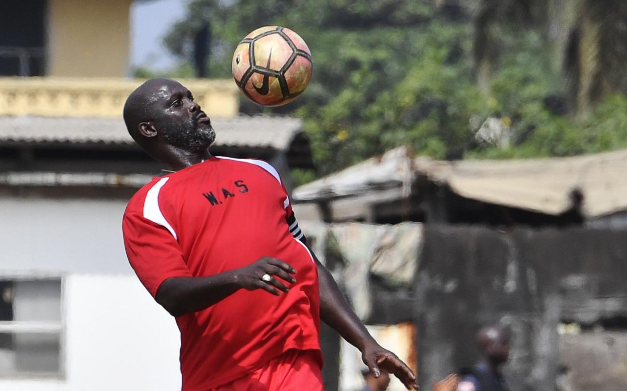 George Weah in action for the last time before he becomes president of Liberia on Monday - AFP