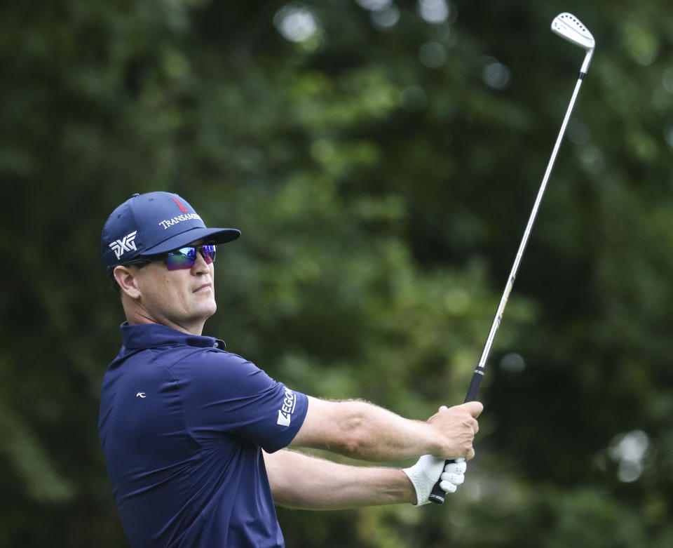 Zach Johnson tees off on the 16th hole during the first round of the John Deere Classic golf tournament Thursday, July 8, 2021, in Silvis, Ill. (Jessica Gallahger/The Dispatch – The Rock Island Argus via AP)