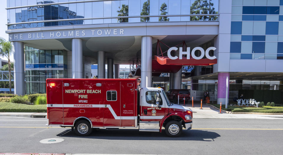 A children's hospital with an ambulance out front