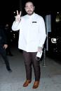 <p>Post Malone throws up a peace sign outside of BOA Steakhouse on Friday in West Hollywood.</p>