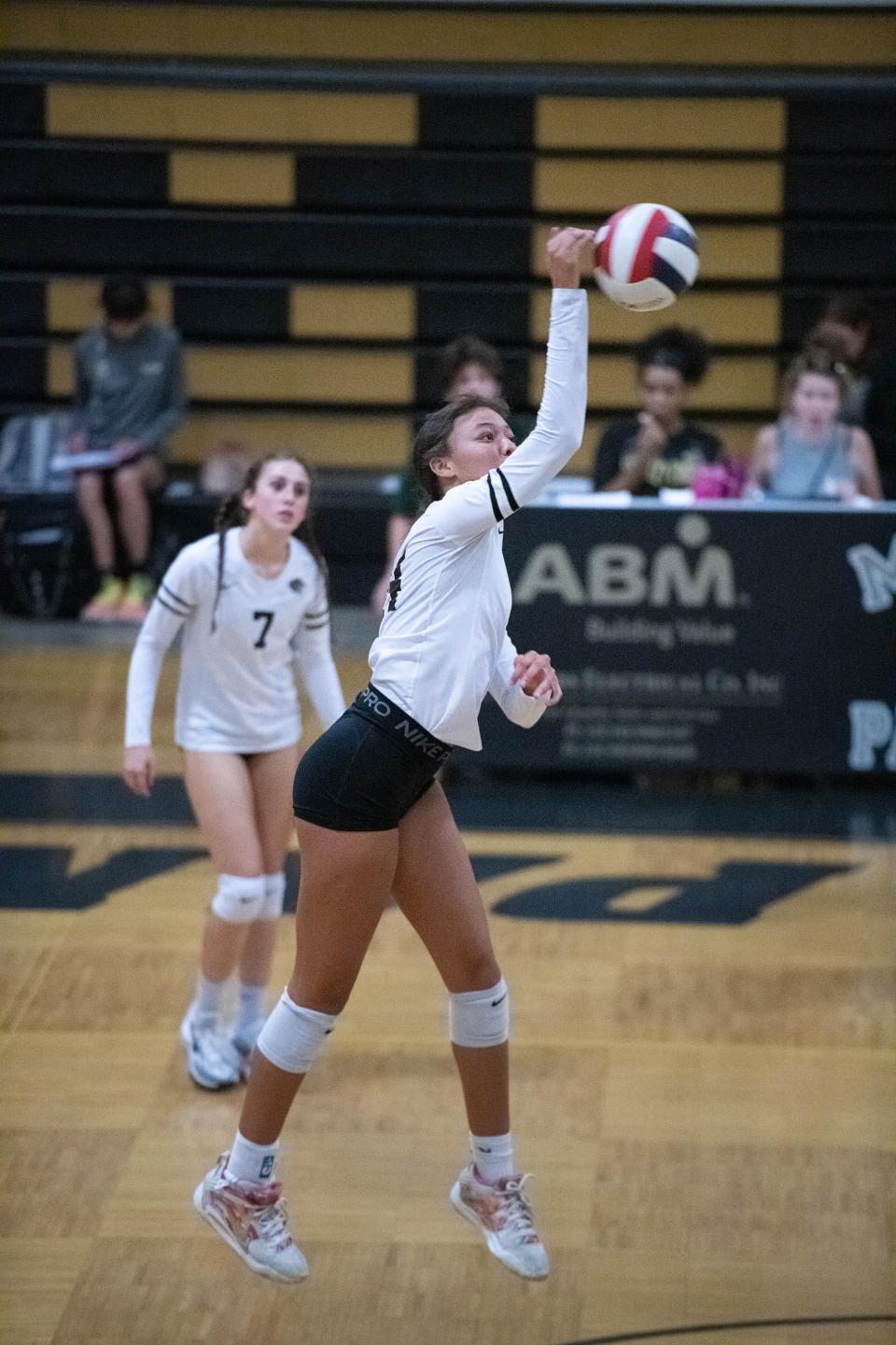 Zariah Allen (14) plays the ball during the Jay vs Milton volleyball match at Milton High School on Thursday, Sept. 21, 2023.