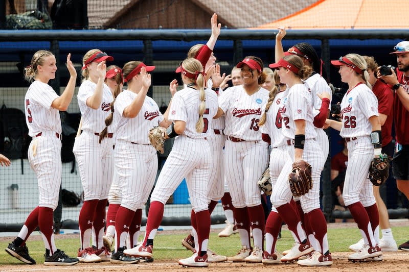 South Carolina celebrates after defeating Utah in an NCAA college softball game on Friday, May 17, 2024, in Durham, N.C. | Ben McKeown, Associated Press