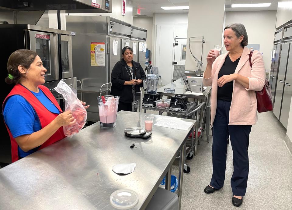 Stacy Dean, deputy under secretary for USDA’s Food, Nutrition, and Consumer Services, samples a smoothie at Cristo Rey Jesuit High School on Sept. 12, 2022.