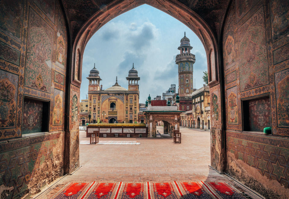 View of Wazir Khan mosque, famous for its extensive faience tile work, situated in the Walled City of  Lahore, in Punjab Province, Pakistan. The Wazir Khan Mosque was built around 1634-1635 AD, during the reign of the Mughal Emperor Shah Jehan. The mosque contains some of the finest examples of Qashani tile work from the Mughal period.