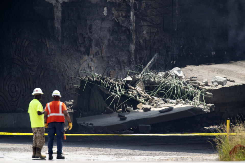 Debris is seen at the collapsed portion of I-95 in Philadelphia, on Sunday, June 11, 2023. A truck fire and partial road collapse have closed Interstate 95 in both directions in Northeast Philadelphia. (Monica Herndon/The Philadelphia Inquirer via AP)