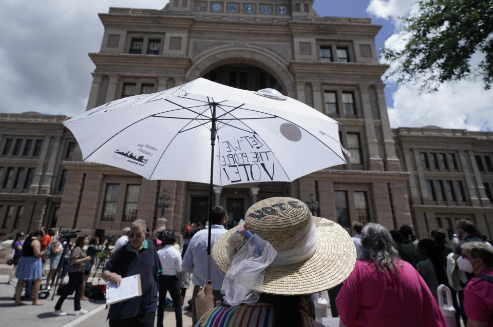 Supporters of voting rights gather for a rally on the steps of the Texas Capitol, Thursday, July 8, 2021, in Austin, Texas. Texas Gov. Greg Abbott called a special session that began Thursday. (AP Photo/Eric Gay)