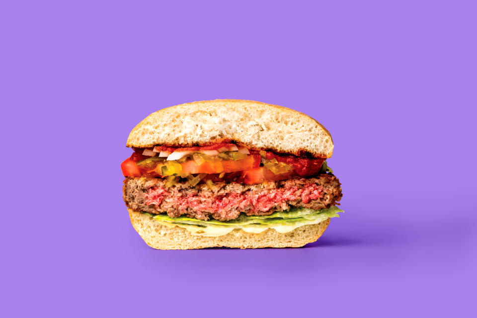 The Impossible Burger's plant-based protein features a shade of pink you'd find in a medium-rare beef burger. (Photo: Impossible Burger)