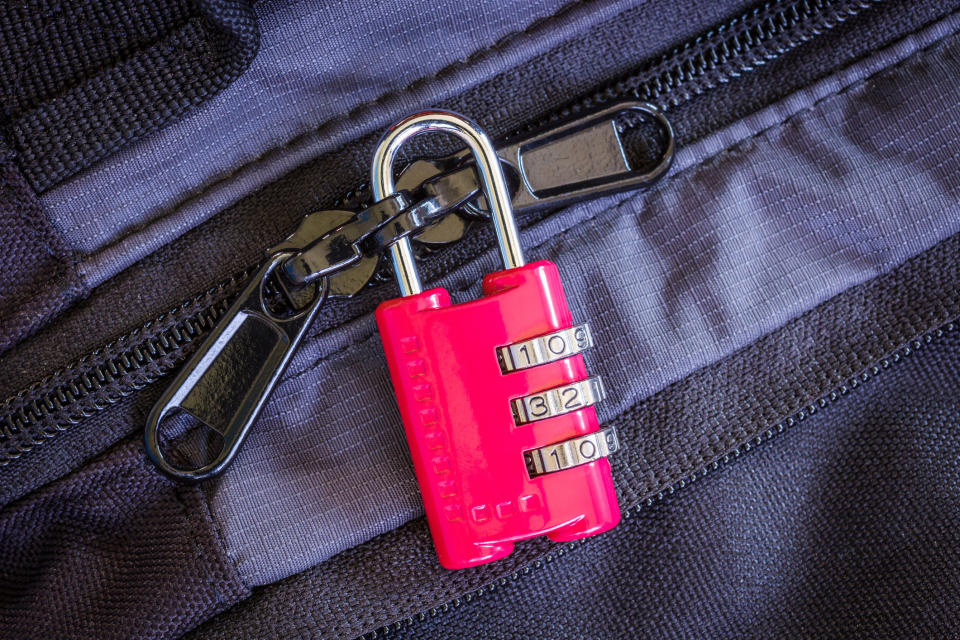 A lock on a piece of luggage.