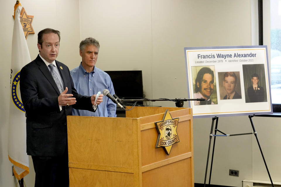 Cook County Sheriff's Detective Lt. Jason Moran, left, responds to a question with Sheriff Tom Dart after Dart announced the identity of "Gacy Victim 5" as North Carolina native Francis Wayne Alexander during a news conference Monday, Oct. 25, 2021, in Maywood, Ill. Alexander's body was among 26 discovered by police in the crawl space of John Wayne Gacy's home more than 40 years ago, with three more found outside the house and four others found in waterways that Gacy admitted killing. Police were able to identify 25 of the victims but the final eight, Alexander among them, were buried without having ever been identified. (AP Photo/Charles Rex Arbogast)