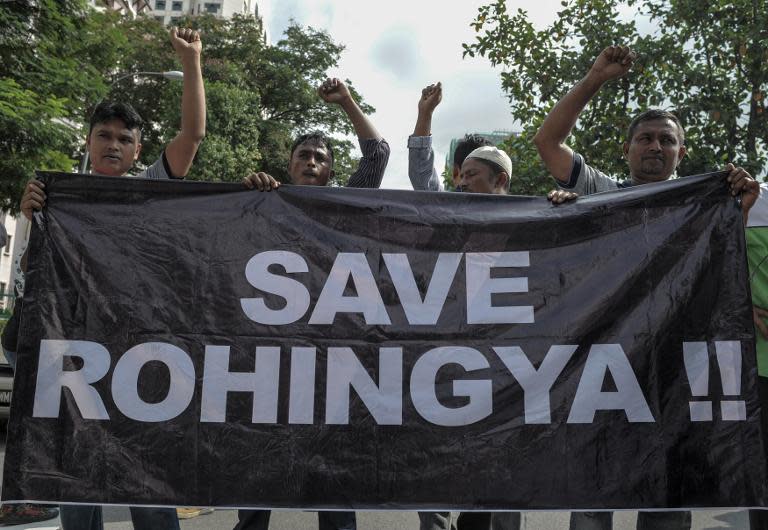 Ethnic Rohingya refugees residing in Malaysia protest outside Myanmar's embassy in Kuala Lumpur, on May 21, 2015, demanding Yangon to end the persecution and ill-treatment of the Rohingya community