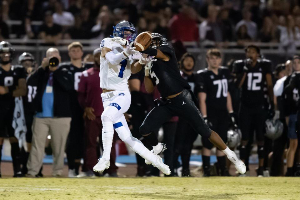 11/12/2021 Chandler, AZ, Hamilton versus Chandler football, Joel Gant (#5) breaks up a pass on Kyion Grayes (#1)