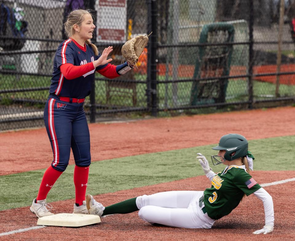 RBC Lily Hagan slides into third after hitting a triple in the third inning. Red Bank Catholic Girls Softball defeats Wall 6-2 in home game on April 4, 2024