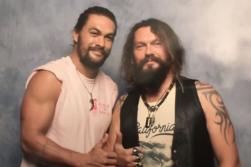 Ian Wills with Jason Momoa (left)