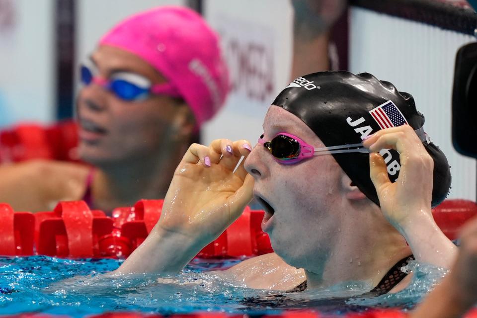 Lydia Jacoby of the US, sees the results after winning the final of the women's 100 metre breaststroke at the 2020 Summer Olympics, Tuesday (AP)