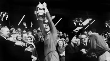 Ron Yeats lifts the FA Cup for Liverpool after their 2-1 victory over Leeds United at Wembley Stadium. , Ron Yeats Wembley Stadium, London, UK, Ref:VM SPO Liverpool win FA Cup 1965, Ron Yeats, Liverpool, FA Cup, Wembley Stadium, London, football, soccer, trophy, victory Copyright: xVarleyxMedia x