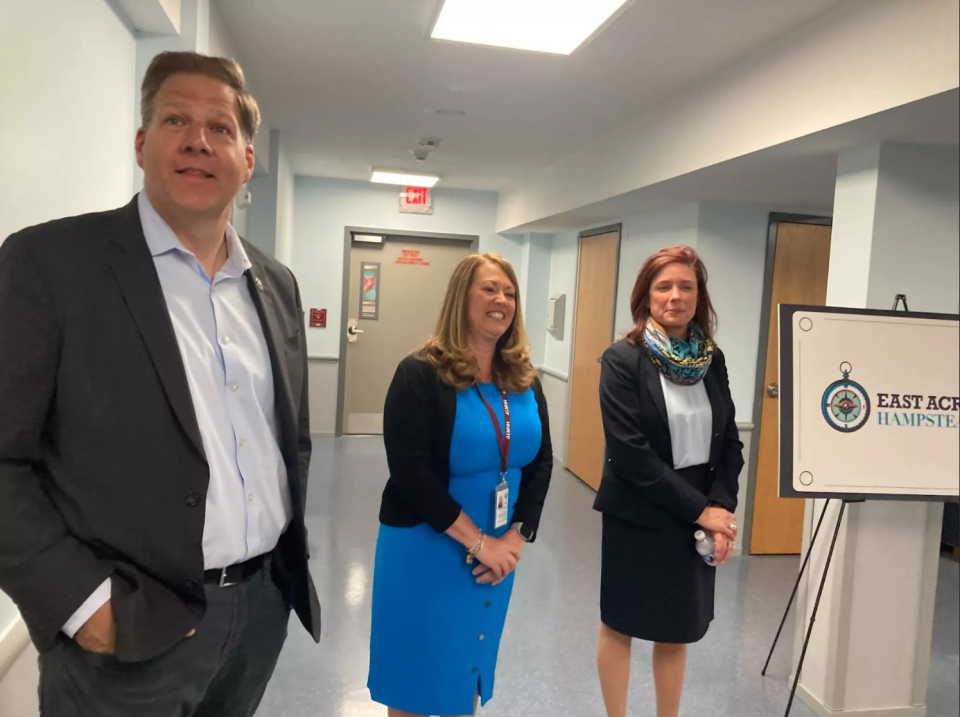 Gov. Chris Sununu, Hampstead Hospital CEO Kathi Collins and interim Health and Human Services Commissioner Lori Weaver tour the newly renovated East Acres at Hampstead campus on May 26, 2023.