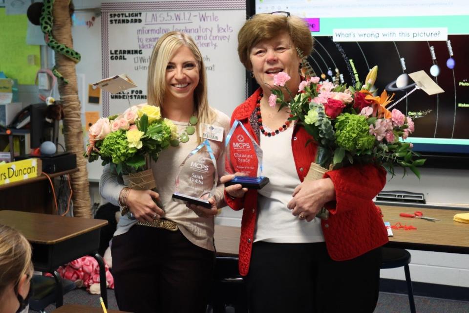 Oakcrest Elementary School Principal Chris Sandy, right, was honored as Marion County's 2022 Principal of the Year, while Oakcrest Assistant Principal Sarah Dobbs. left, was recognized as the county's 2022 Assistant Principal of the Year.